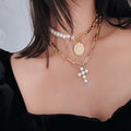 THE PEARL CROSS