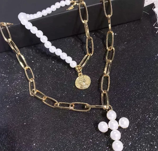 THE PEARL CROSS